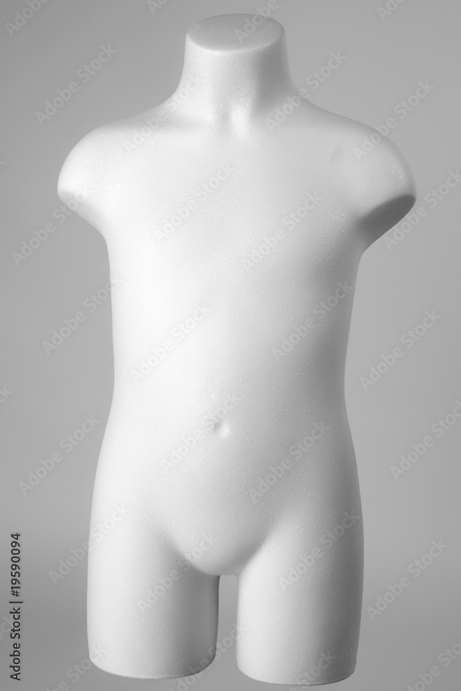 Mannequin of a child in white over gray Mannequin of a child in white over gray