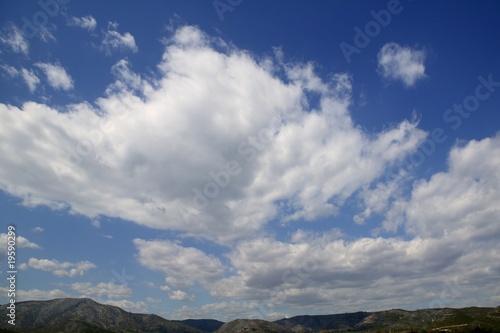 Blue sky white clouds in a summer clean day