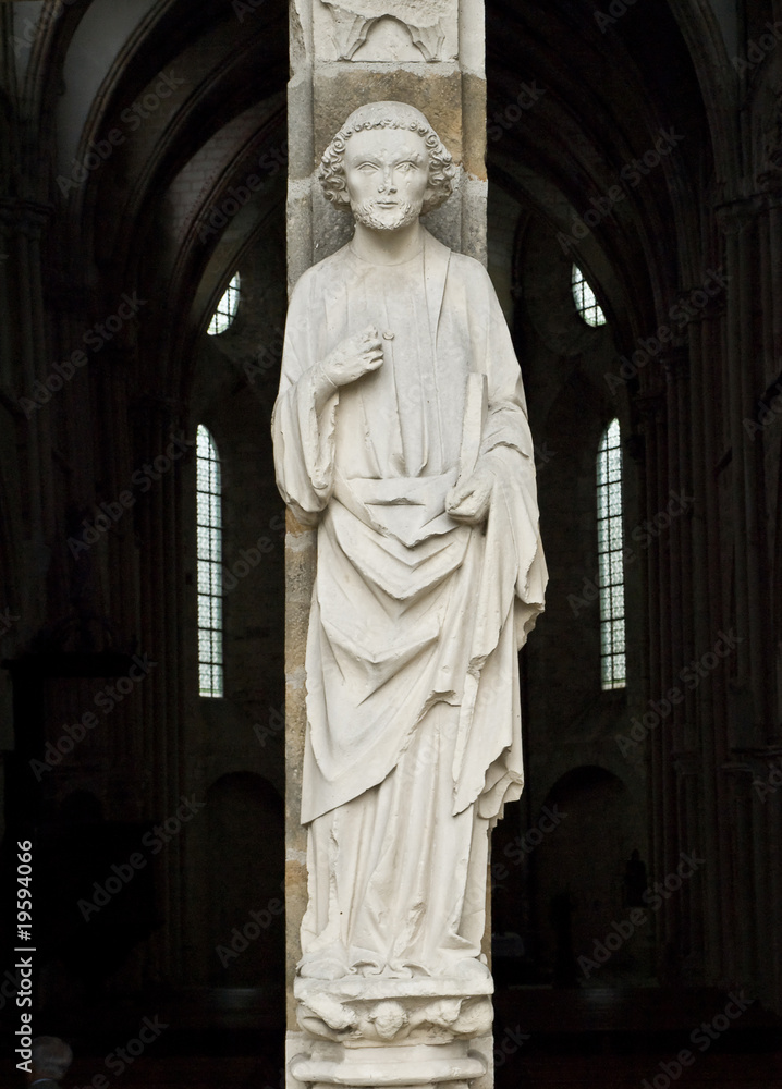 Man of a God. Entrance of the XIII century church. France. Man of a God. Entrance of the XIII century church. France.