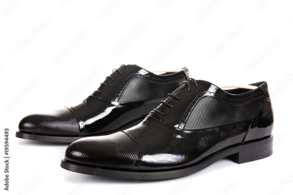 Black male shoes isolated on white. Black male shoes isolated on white.