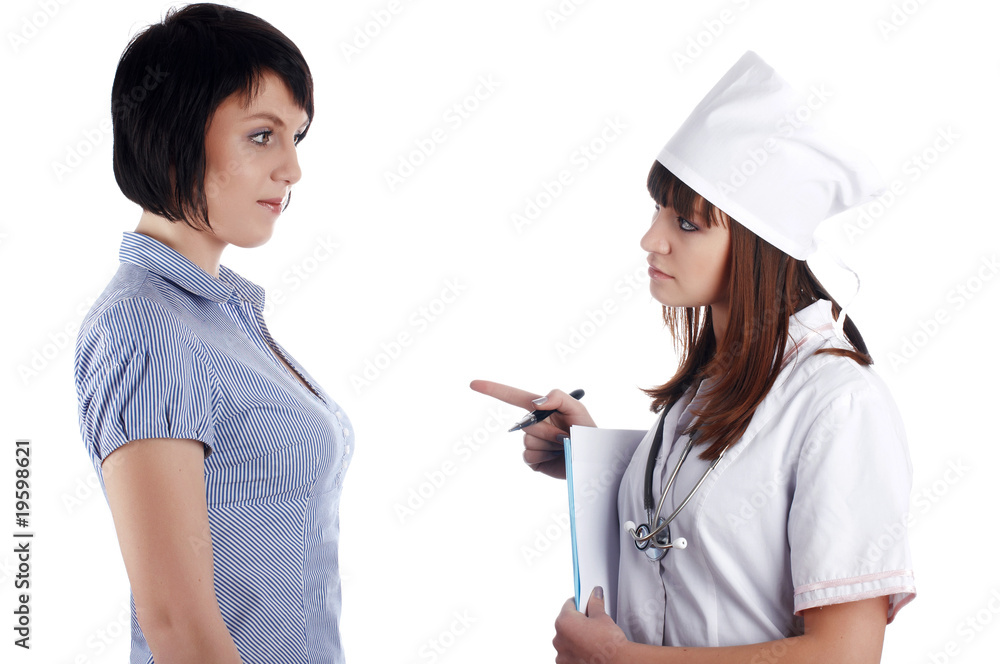 The young charming staff nurse with patient The young charming staff nurse with patient