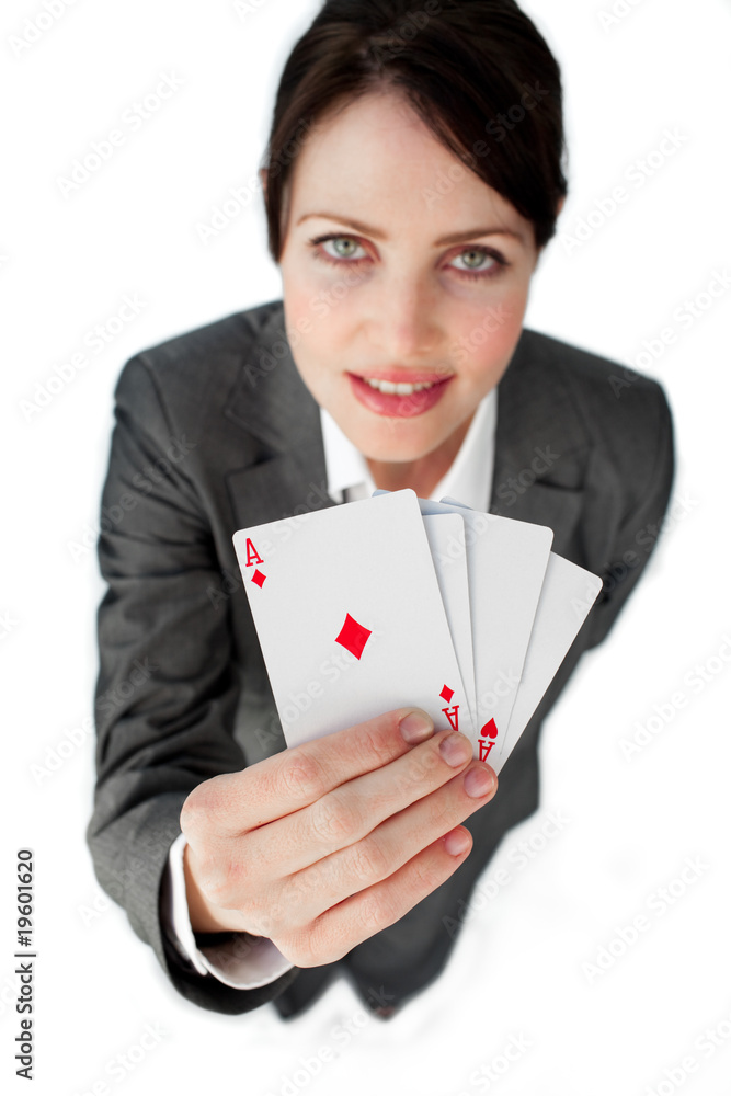 Charming businesswoman holding a full deck aces Charming businesswoman holding a full deck aces
