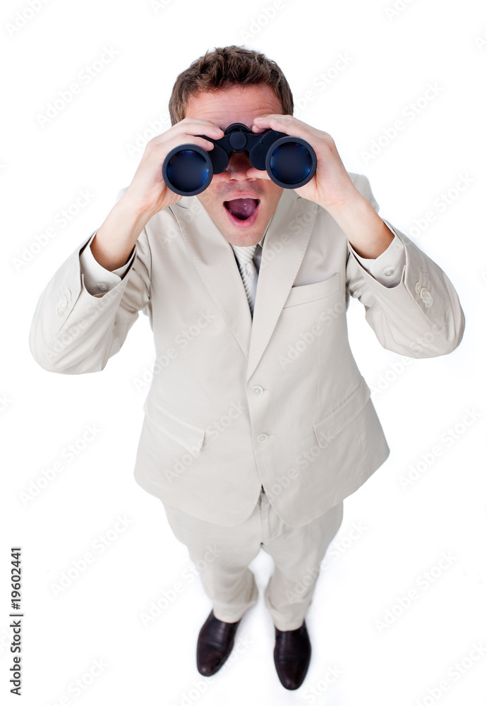 Surprised businessman looking through binoculars Surprised businessman looking through binoculars