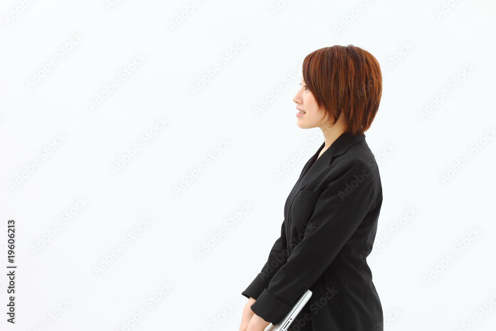 スーツ女性横向き Stock 写真 Adobe Stock