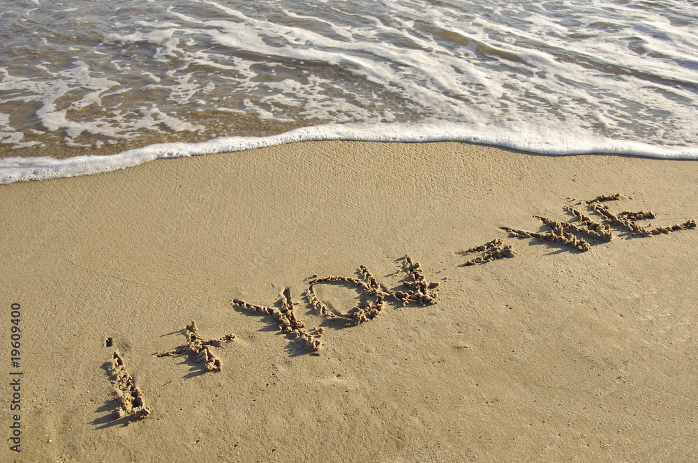 Written on the sand. Theme of love and unity.