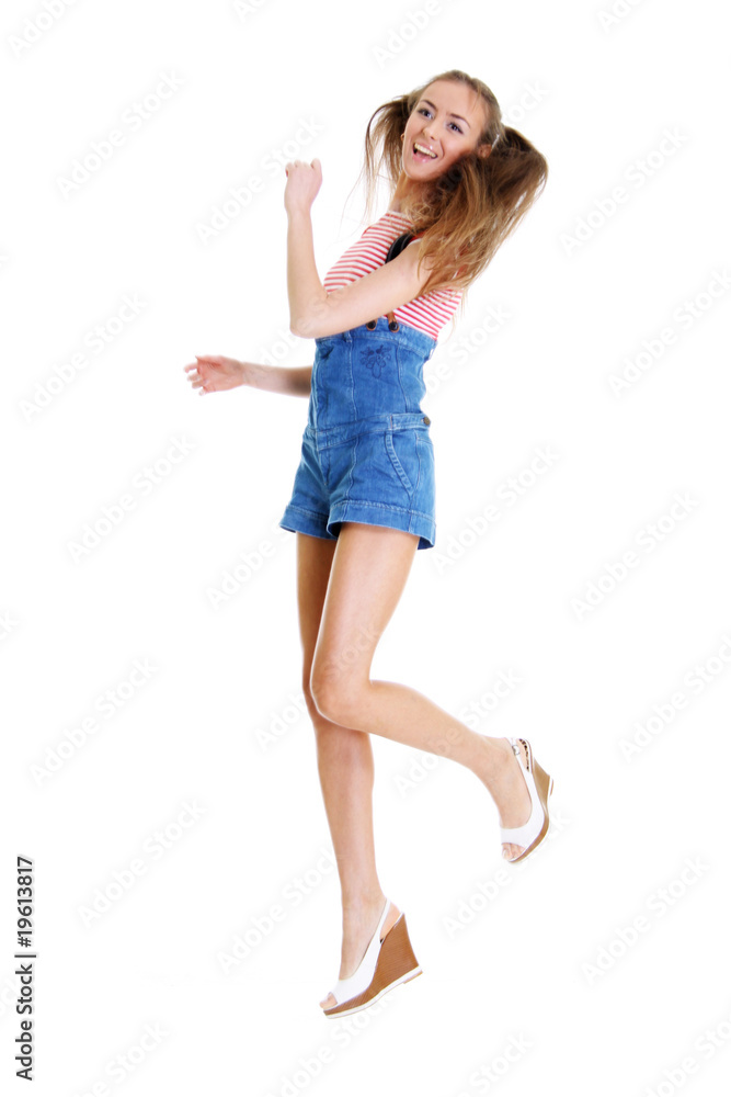 Full length action view girl jumping in air Full length action view girl jumping in air