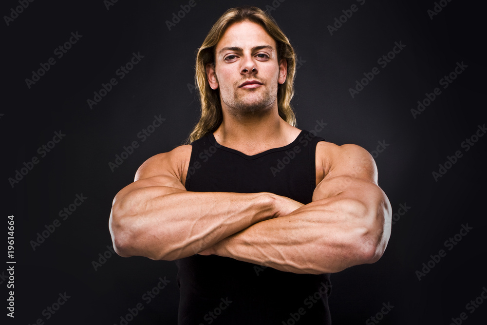 Sexy muscular man isolated on black Sexy muscular man isolated on black