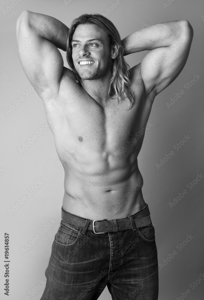 athletic sexy male body builder with the blonde long hair. gladi Stock  Photo | Adobe Stock