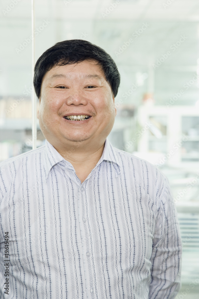 Obraz premium Businessman Smiling at Camera