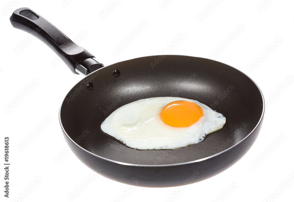 A fried egg in a frying pan A fried egg in a frying pan