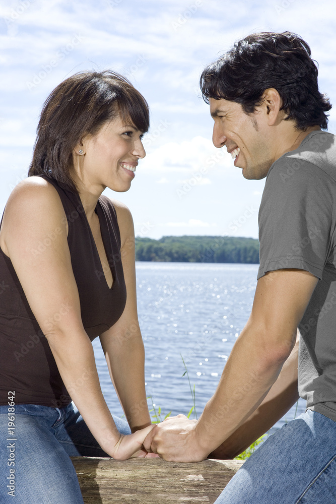 Couple Smiling at Each other Outdoors