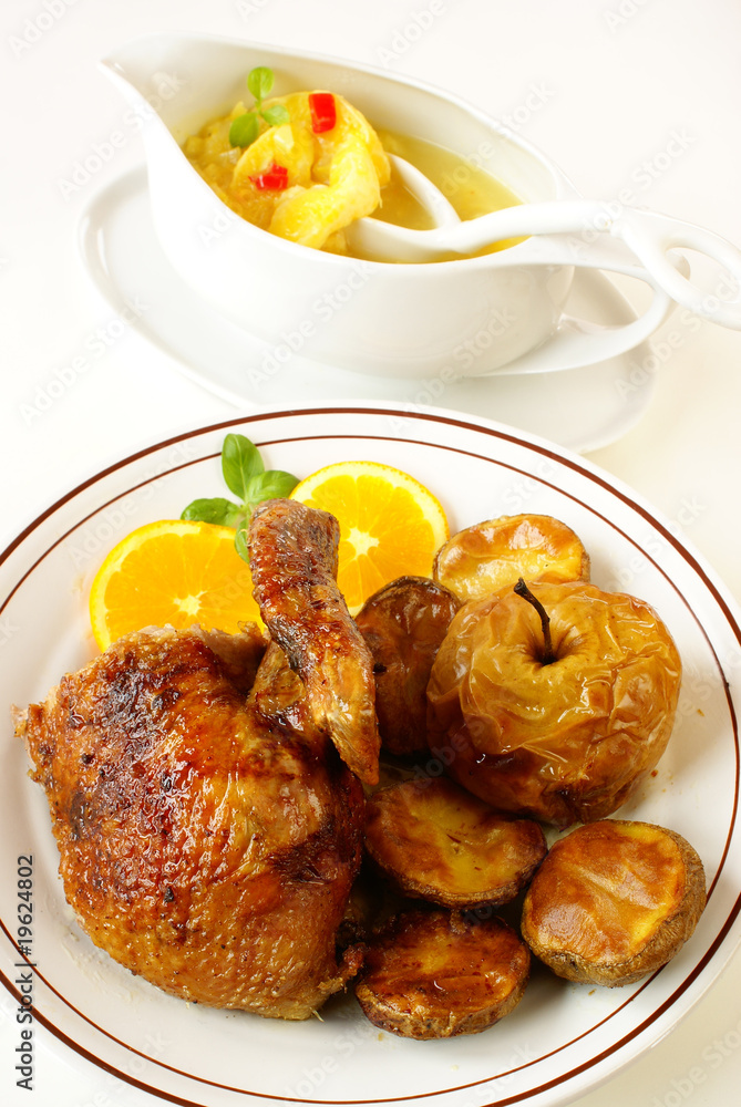 Roasted duck served with orange sauce