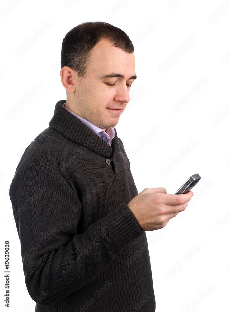 Young man calling on a mobile phone Young man calling on a mobile phone
