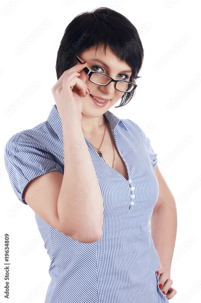 The charming brunette in a blue shirt The charming brunette in a blue shirt