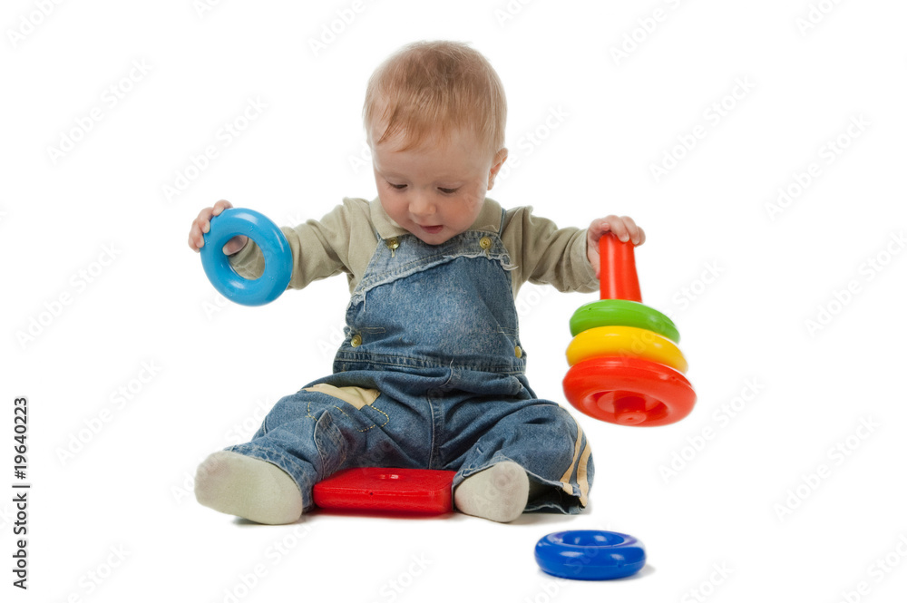 little boy and toys.