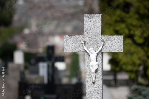 Jesus on a cross in graveyard
