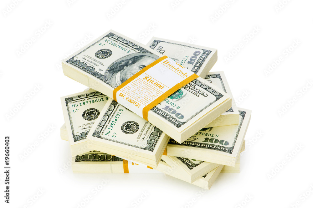 Stack of dollars isolated on the white Stack of dollars isolated on the white