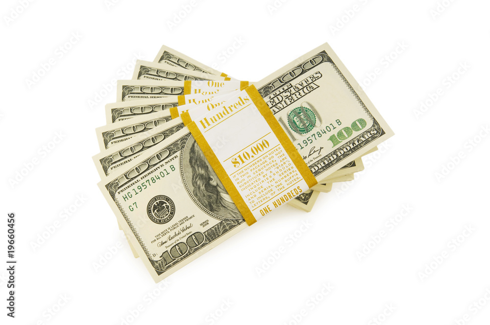 Stack of dollars isolated on the white Stack of dollars isolated on the white