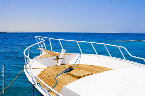 White yacht moored by the pier in the Red sea, Egypt © Evgeny Korshenkov