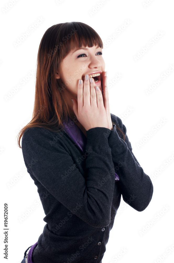 The cheerful charming brunette female in dark blue sweater The cheerful charming brunette female in dark blue sweater