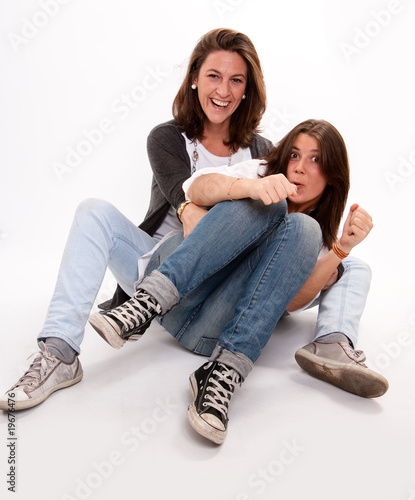 Mother and teenage daughter...
