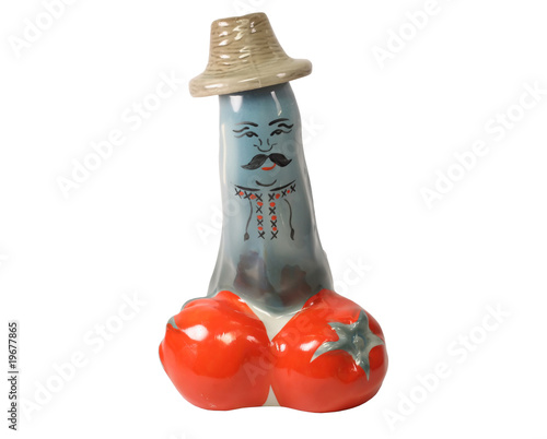 Toy in form penis, 2 tomato and man in hat