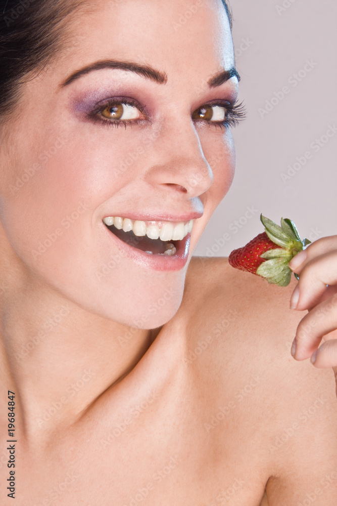 Image of beautiful girl holding strawberry enjoy Image of beautiful girl holding strawberry enjoy
