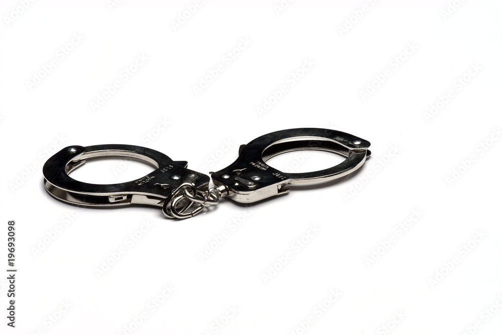 handcuffs isoalted on a white background handcuffs isoalted on a white background