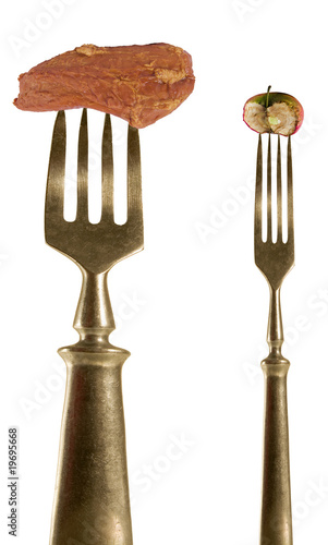 Two fork with bacon and apple.