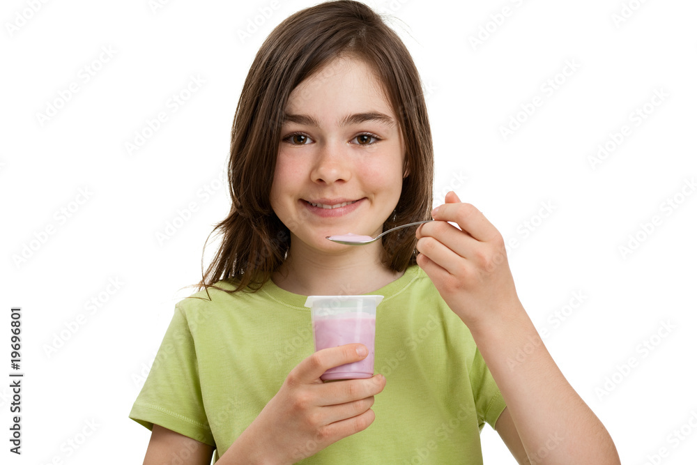 Girl eating yogurt isolated on white background Girl eating yogurt isolated on white background