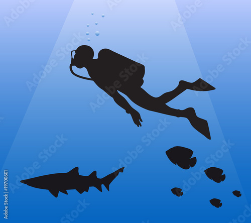 diver diving in the sea with shark and fishes