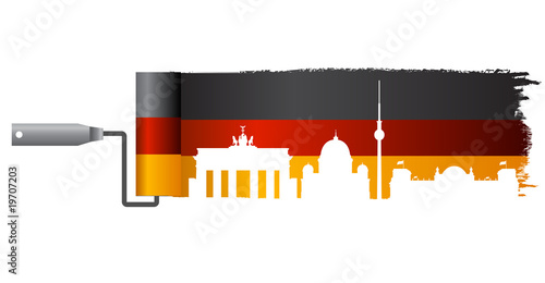 painted flag of germany with landmarks