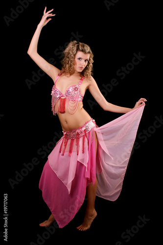 Belly dancer isolated on a black background