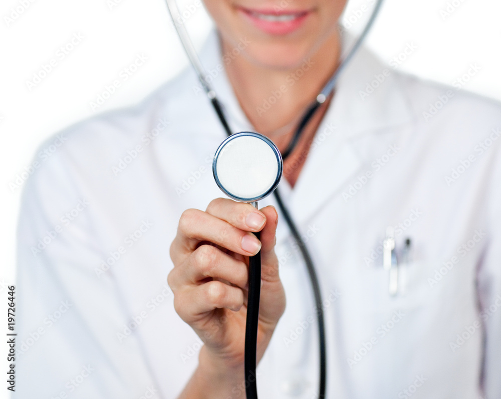 Close-up of a female doctor showing a stethoscope Close-up of a female doctor showing a stethoscope