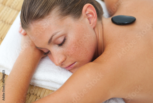 Relaxed woman getting spa treatment