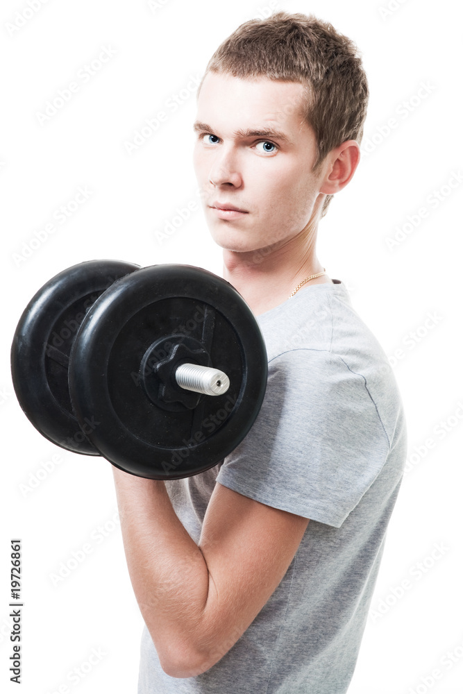 Concentrated young man lift weights