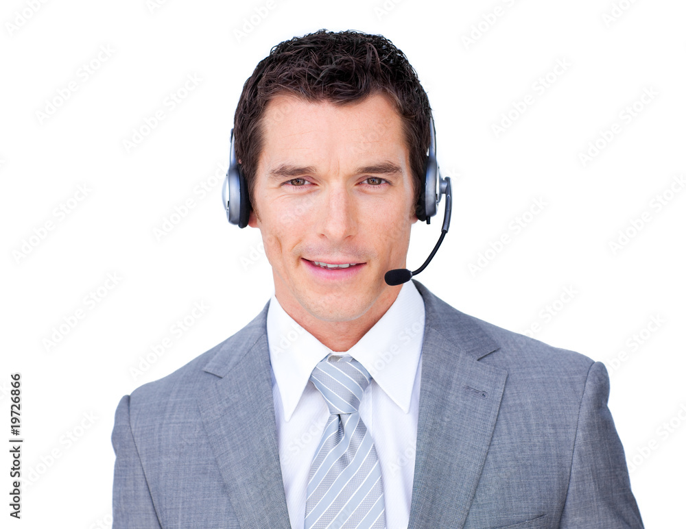 Self-assured businessman using headset Self-assured businessman using headset