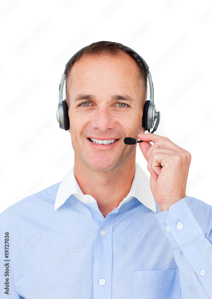 Self-assured mature businessman using headset Self-assured mature businessman using headset