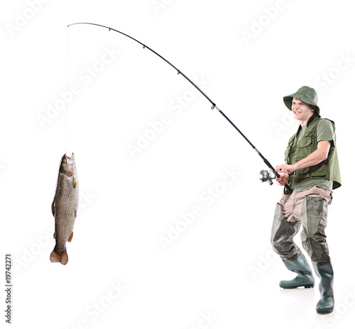 Young euphoric fisherman catching a fish