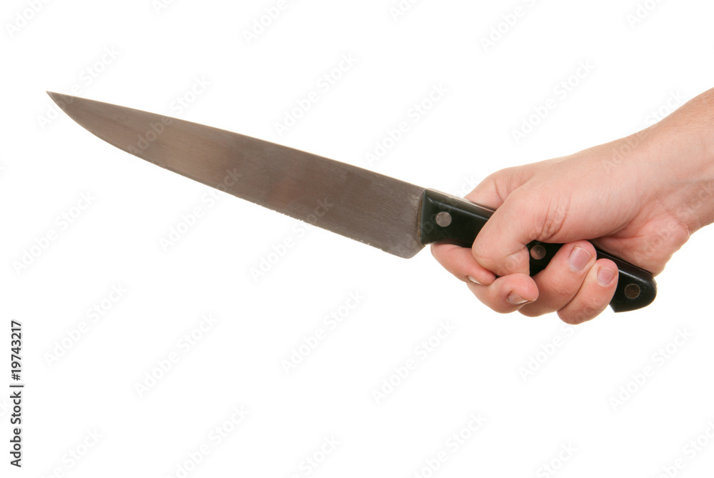 Hand holds knife