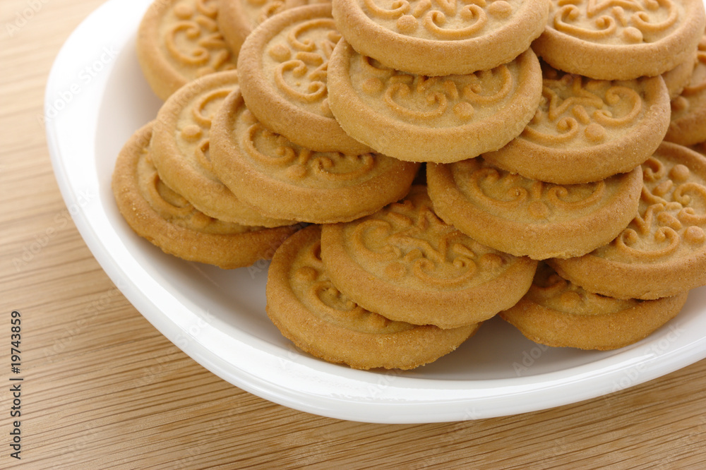 Yellow cookies on plate Yellow cookies on plate