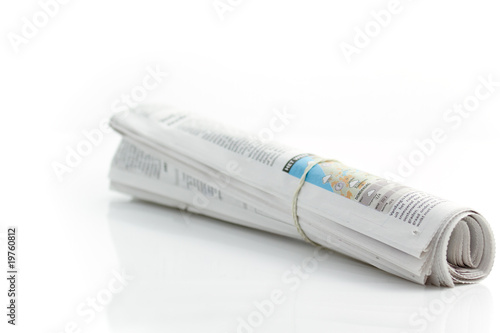 Rolled up newspaper