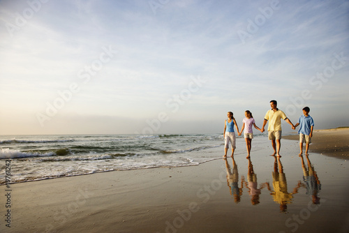 Family Walking on Beach