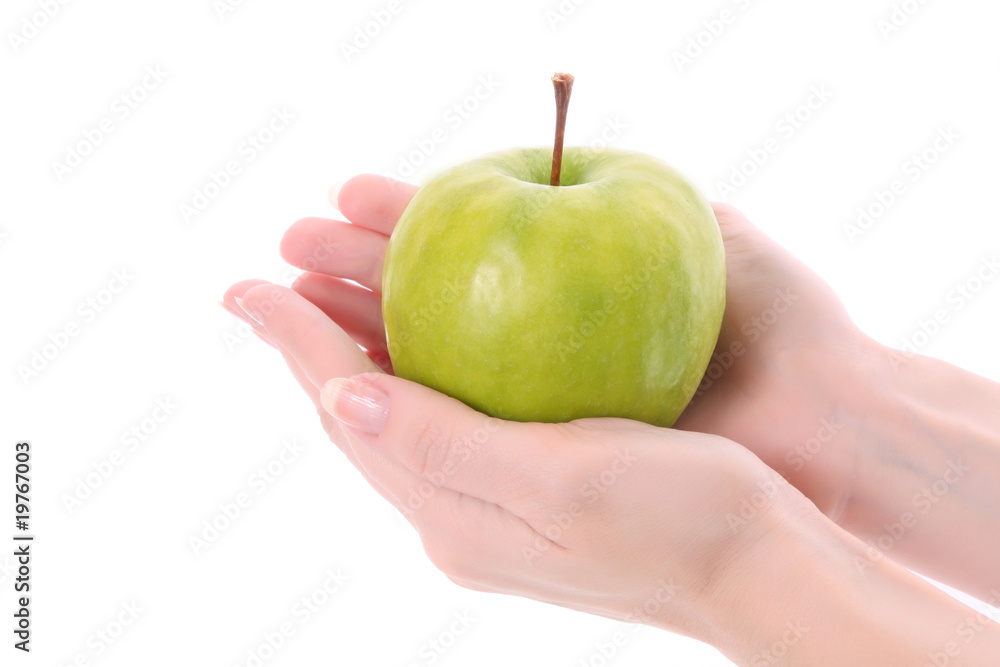 Fresh green apple in hands Fresh green apple in hands