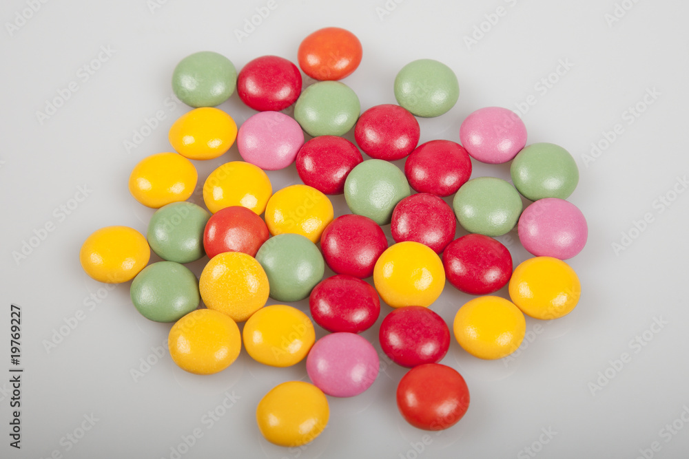colored candies on a light background colored candies on a light background
