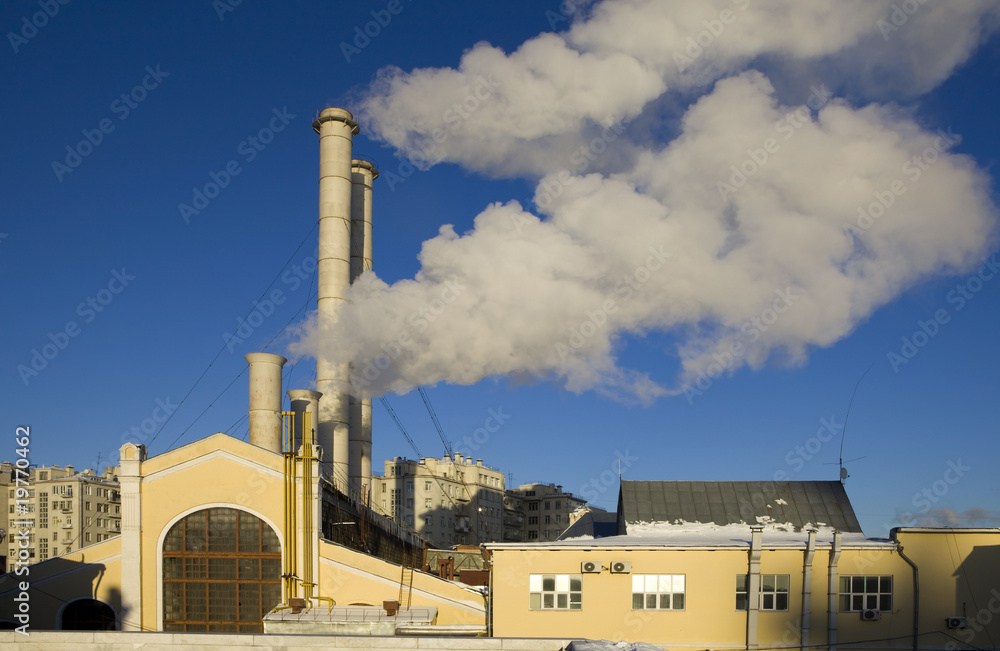 Power plant on a winter day, sunset Power plant on a winter day, sunset