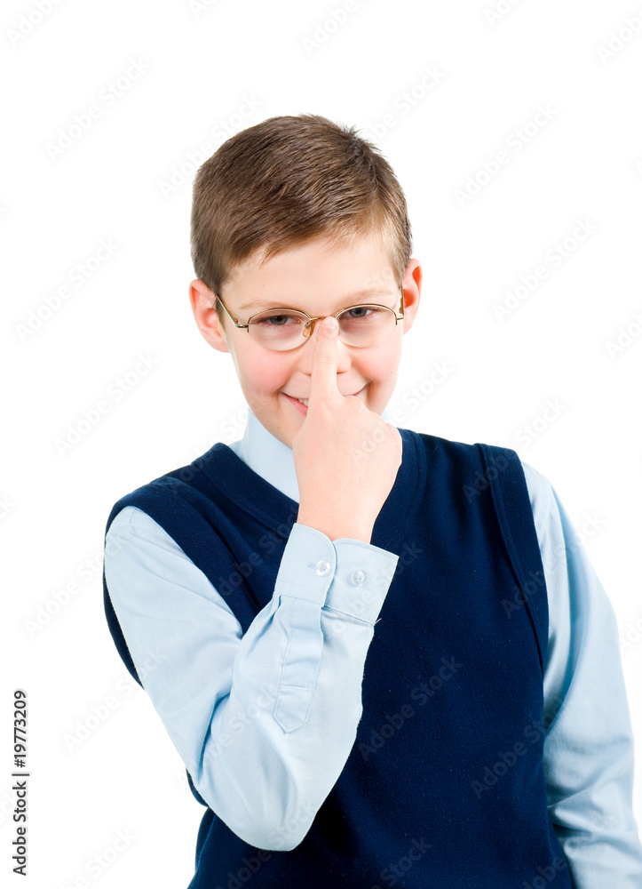 Smiling young schoolboy in studio shot isolated on white Smiling young schoolboy in studio shot isolated on white