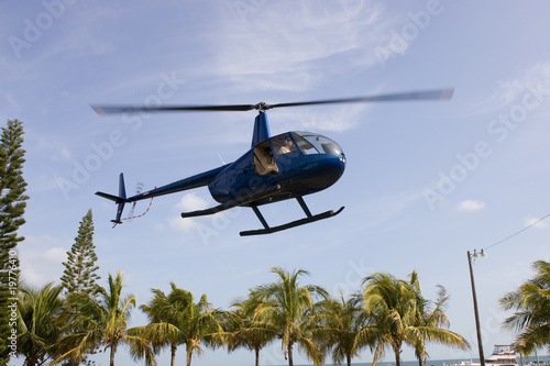 Robinson R44 taking off