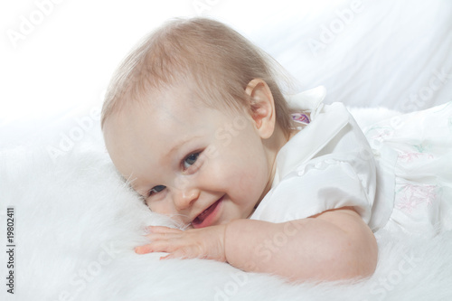 Innocent caucasian baby in high key