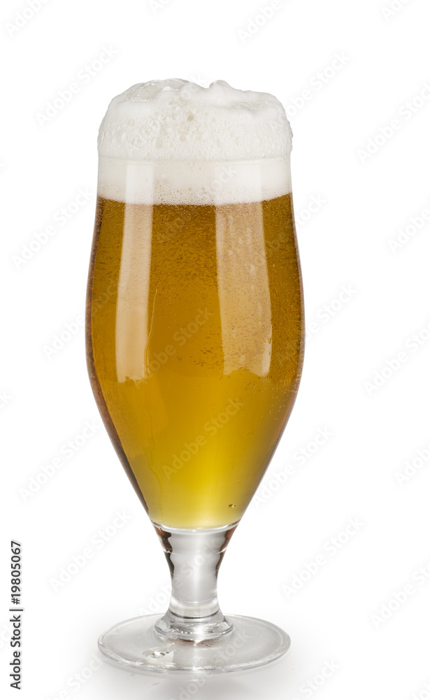 Alcohol light beer glass with froth isolated over white Alcohol light beer glass with froth isolated over white